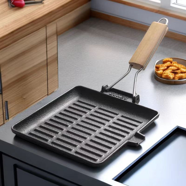 Cast iron pan Cast iron striped steak frying pan Wooden handle folding frying pan Factory direct cast iron striped frying pan