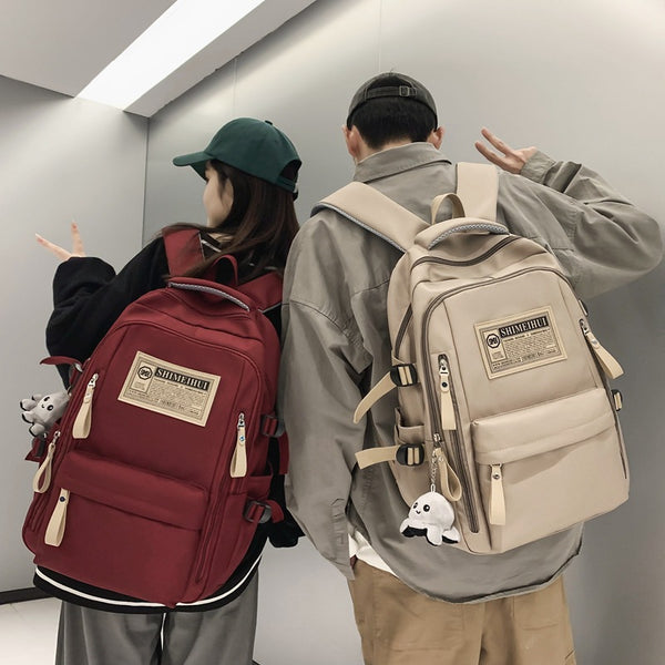 Spring and summer simple travel backpack computer backpack casual solid color ultra-light junior high school students large-capacity schoolbag