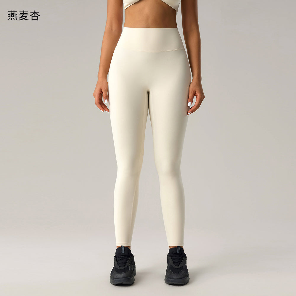 Fashion cross-border nude long sleeves yoga fitness suit women's back sports intimateshigh waist hip lifting tight nine-point pants