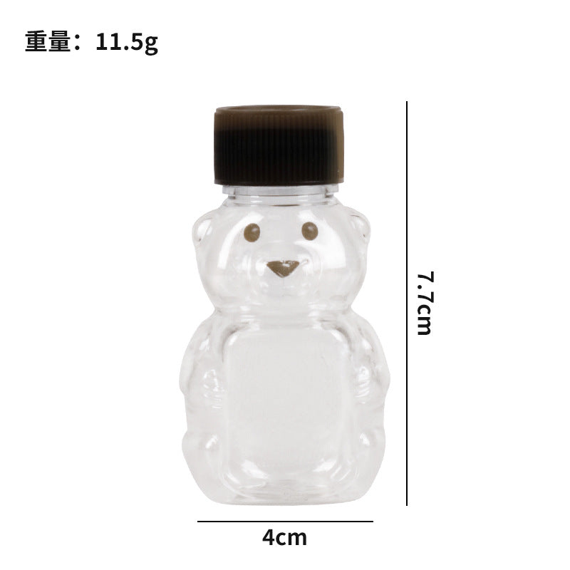 hot seller: bear-shaped clear pp plastic bottles with lids - perfect for juice, drinks, sauces, and honey. airtight sealing