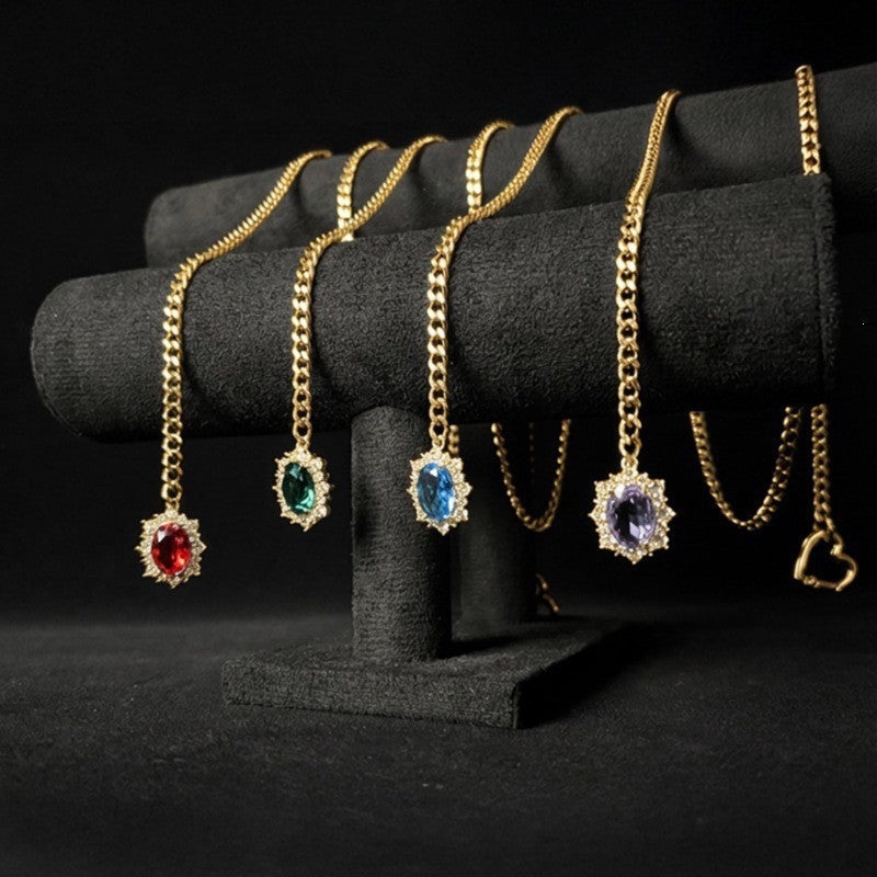 Women's heart-shaped slide chain necklace with detachable heart o-ring, gold cuban chain, and sparkling crystal pendant, adjustable