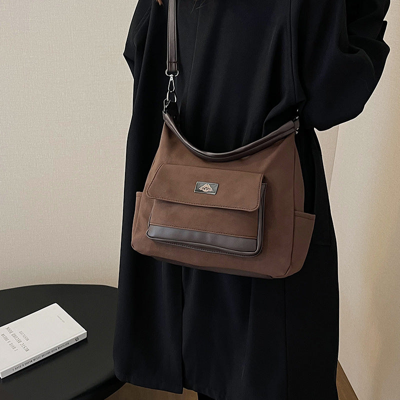 Foreign trade popular women's bags retro large-capacity shoulder messenger bags European and American mail carrier underarm simple casual mail carrier bags