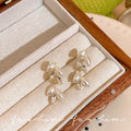 French-style, ultra-sparkly zircon wheat ear tassel earrings. unique design, high-end aesthetic, subtly luxurious, fashionable, and versatile ear accessories