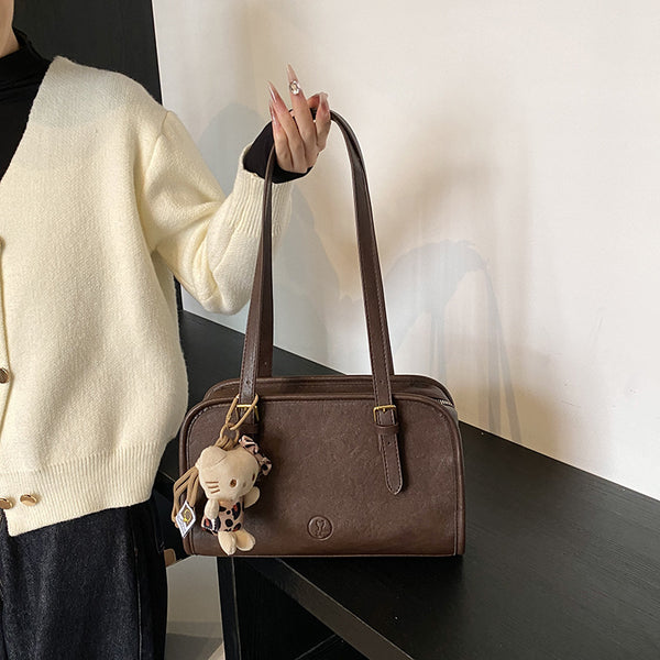 Retro portable bowling bag women's 2025 autumn and winter new simple fashion handbag large-capacity commuter bag