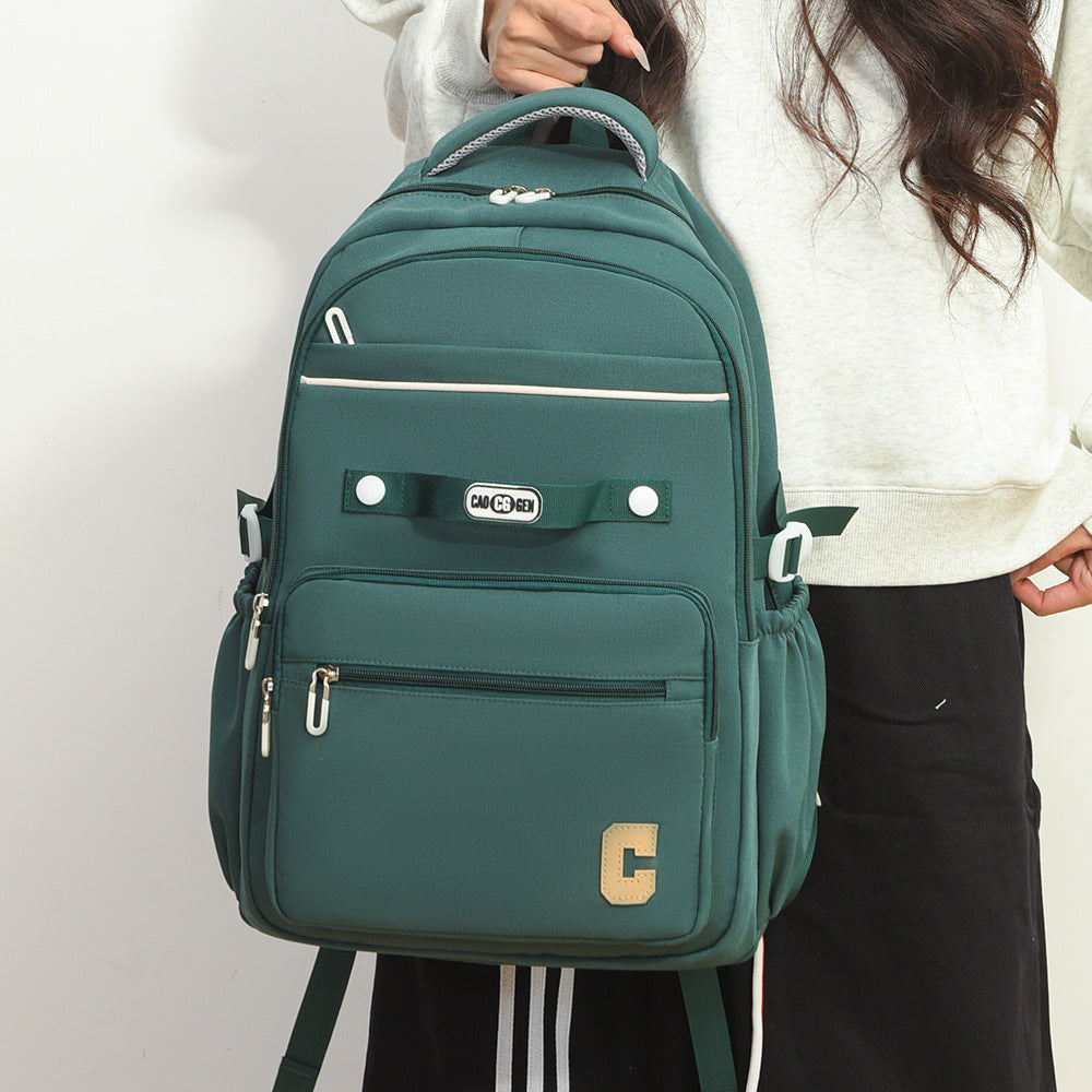 New solid color versatile student schoolbag large capacity backpack junior high school student computer backpack leisure travel