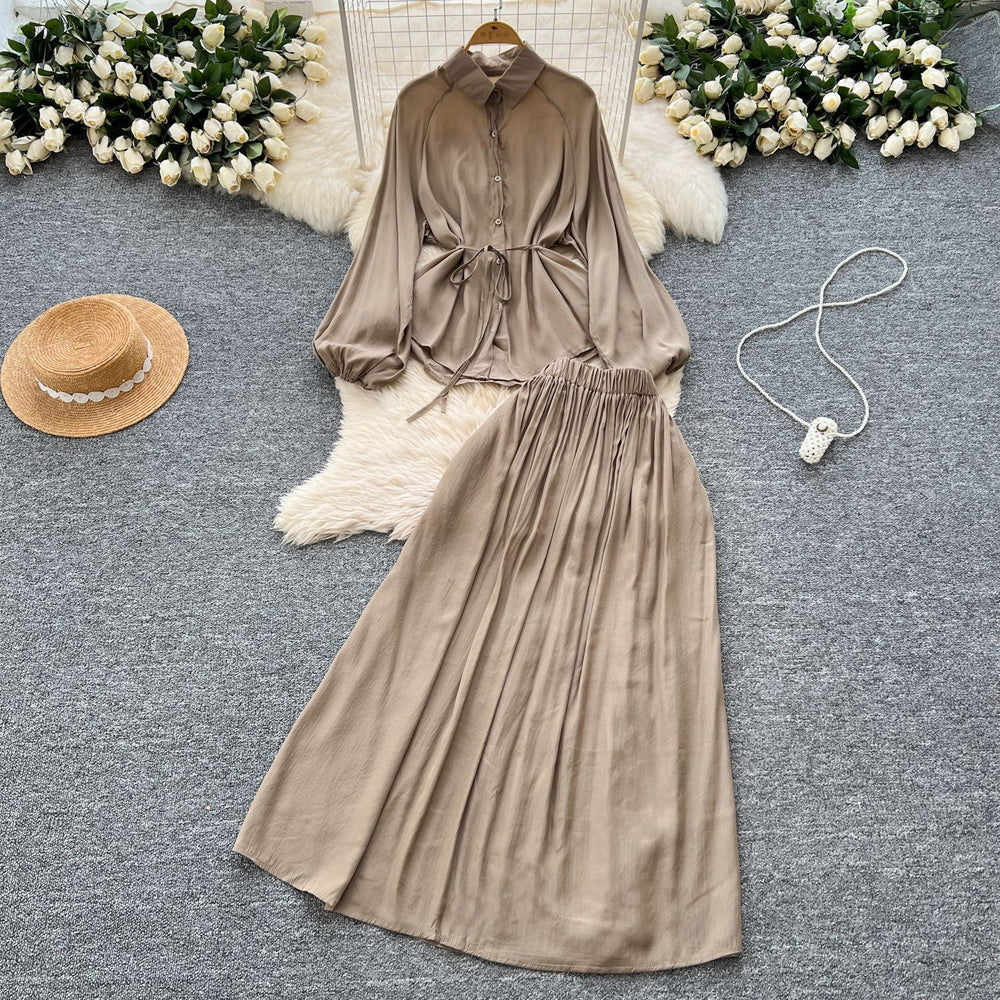 Minimalist solid color elegant women's spring outfit: bubble sleeve tie-up blouse + elastic waist slimming midi skirt