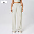 High-waisted, straight-leg pants with a drawstring waistband. versatile and casual, these long pants are designed to elongate the legs with a relaxed, wide-leg fit. perfect for running and workouts. style d25048