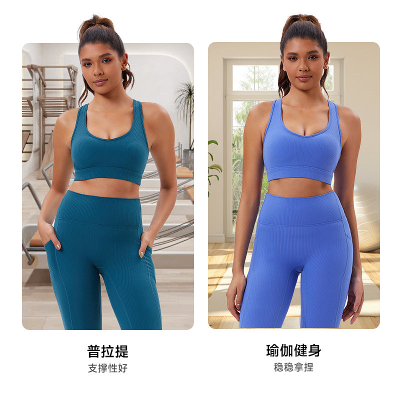 Eco-friendly recycled fabric new slimming criss-cross back yoga tank top with built-in bra pads