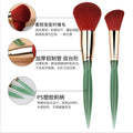 makeup brush set, 12-piece, featuring soft bristles, including a foundation brush, angled contour brush, and a complete set of makeup brushes