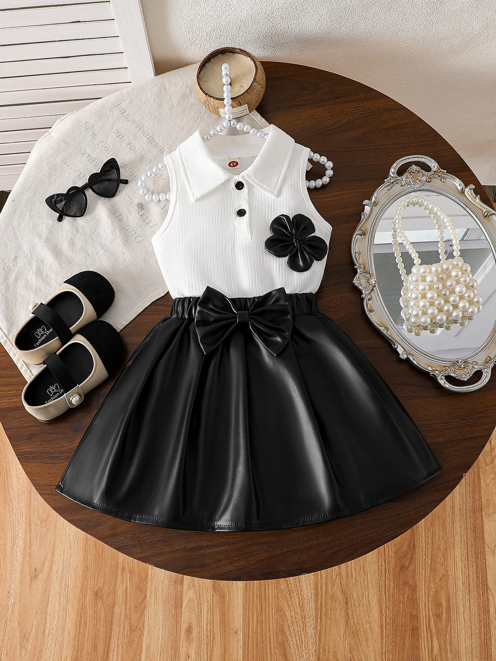 cross-border girls' fashion set: european & american style floral solid color top + a-line pu leather skirt with bow detail