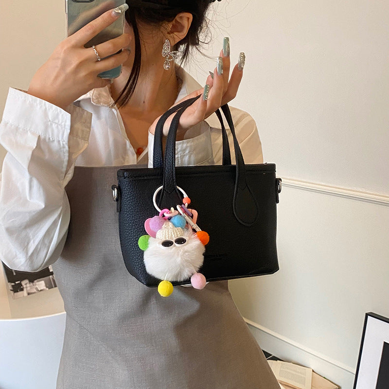 Foreign-style high-end sense portable bucket bag women's 2025 new casual simple messenger bag commuter shoulder bag