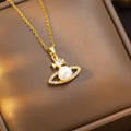 [titanium steel] hot-selling queen mother saturn pearl necklace women's earrings niche style classy light luxury sweater chain jewelry