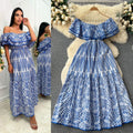 Elegant, sophisticated, and effortlessly chic: this ruffled, off-the-shoulder, lace-embroidered, and cutout maxi dress is perfect for a glamorous beach vacation