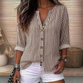 Fashion holiday style vertical pattern blouse, light fabric, half placket, wooden buttons, loose three-quarter sleeves, daily casual lining