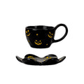 Creative halloween-themed ceramic cup and saucer set, featuring an irregular design with pumpkin and bat motifs. perfect for coffee or tea