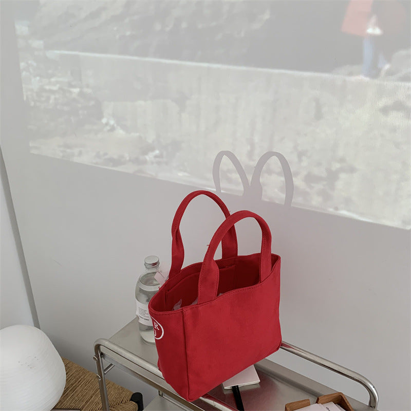 New bag female Korean generation with the same letter printed canvas handbag bento bag simple casual light tote bag