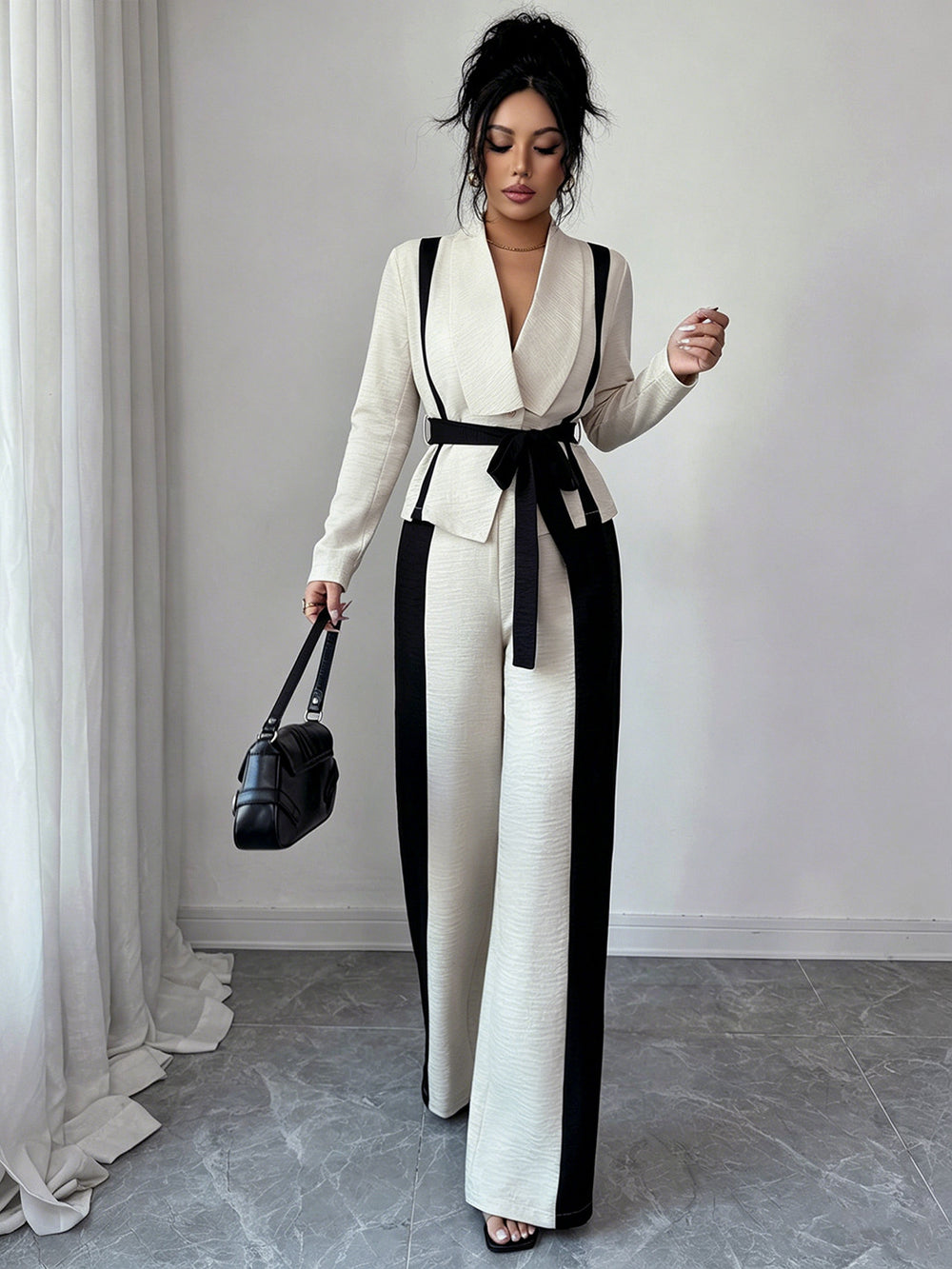 minimalist color block two-piece set: v-neck, tie-waist jacket with black and white wide-leg pants