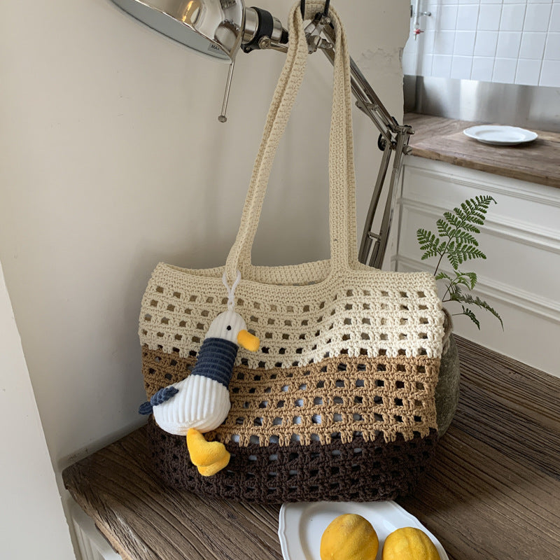 Cross-border 2025 new simple large-capacity woven bag women's wool crocheted hollow shoulder bag gift vacation beach bag