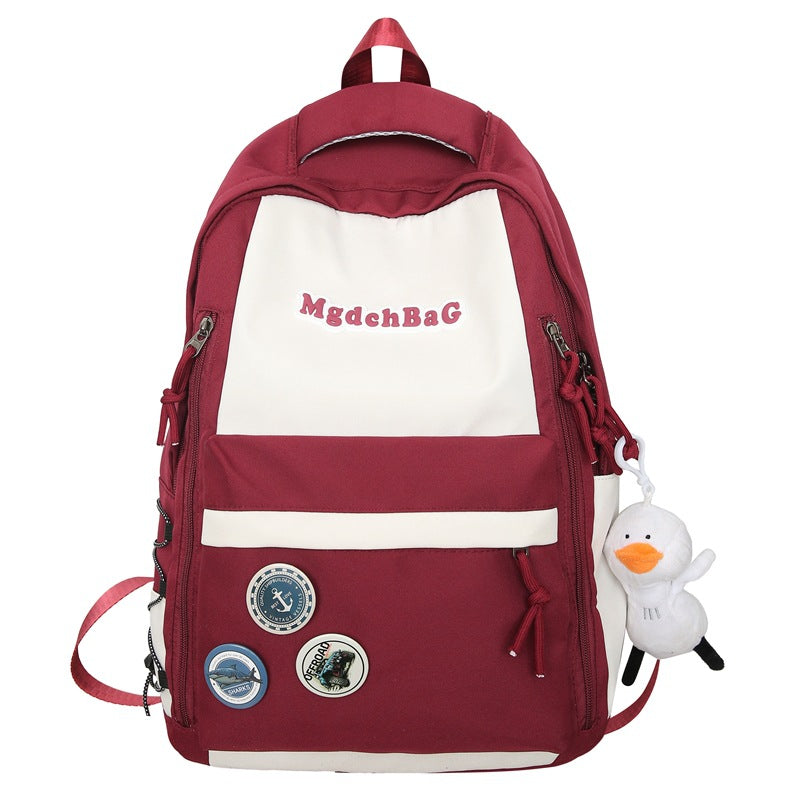 Large capacity casual backpack schoolbag male and female high school junior high school student schoolbag primary school student college student wholesale