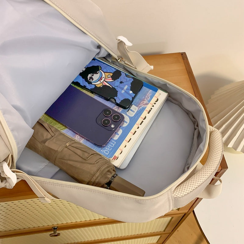 New schoolbag female middle school students simple and versatile large capacity fashion solid color backpack high school students college style backpack