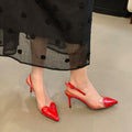 French pointed-toe stiletto sandals for women, 2026 new collection, red patent leather with transparent paneling, single buckle strap high heels