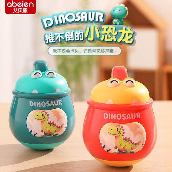 Cross-border dinosaur tumbler infant educational early education 0-1 year old baby sound and light rattle tumbler wholesale toys