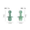 Green cartoon spoon and fork