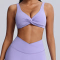 Fashionnew arrivalnude sports intimatesfemale sexy twist shockproof yoga bra beautiful back containing breast pad sports bra