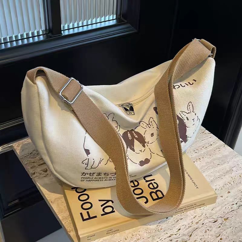 Niche style canvas bag for women 2024 spring and summer new arrivalcasual large capacity student shoulder work clothing bag crossbody dumpling bag