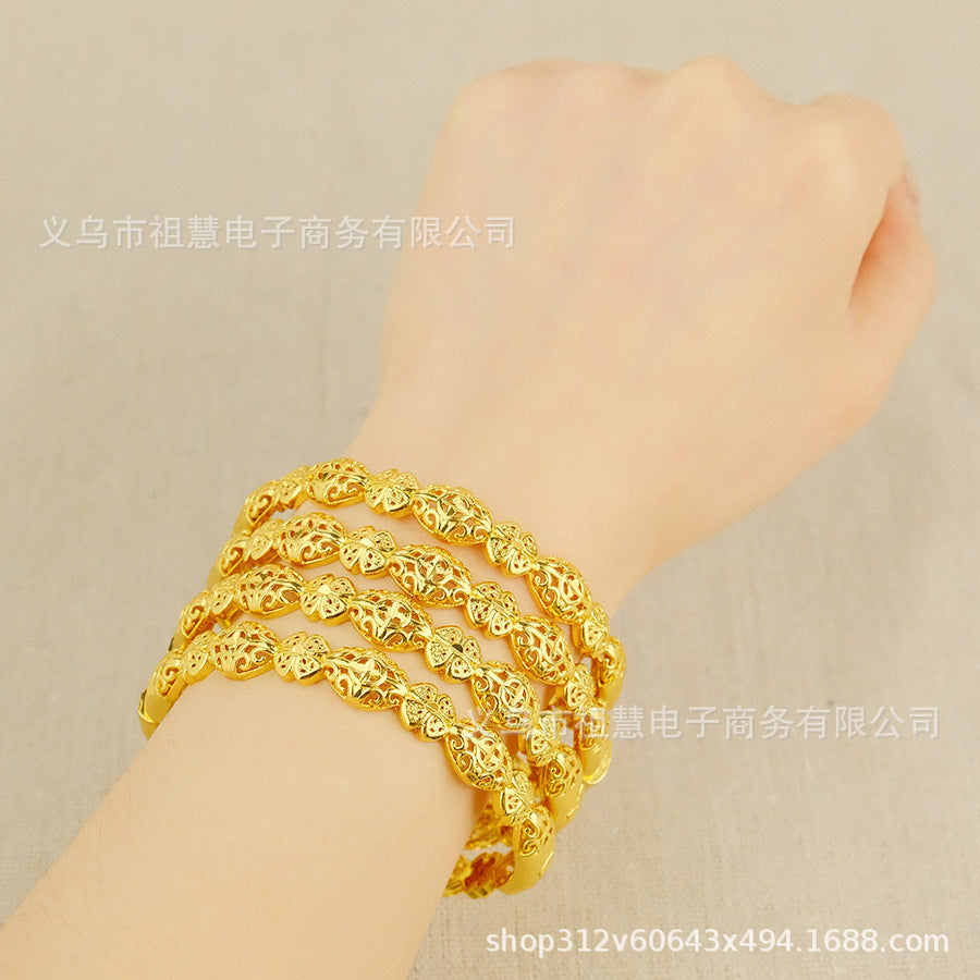 Wholesale middle eastern women's floral hollow-out design bangle dubai gold-plated luxury bracelet