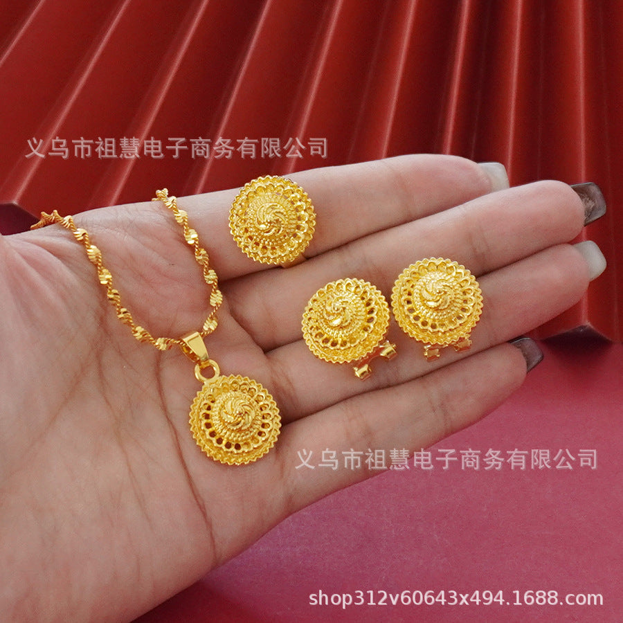 Wholesale cross-border middle eastern rotating floral design gold plated necklace pendant earrings ring three-piece jewelry set