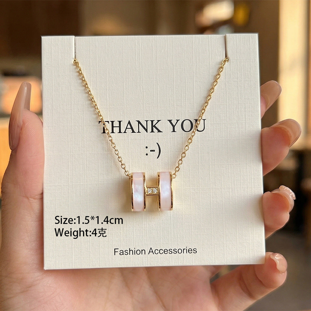 Copper inlaid zirconium four-leaf clover necklace for women, titanium steel real gold plating popularinsfashion flower exquisite sweater chain jewelry