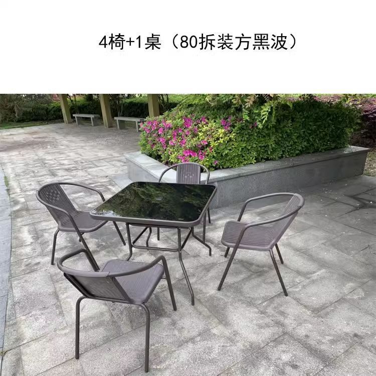 Outdoor table and chair set with umbrella, sunshade, perfect for outdoor cafes, bubble tea shops, and casual outdoor seating. features a wrought iron frame and rattan chairs, ideal for patios and gardens