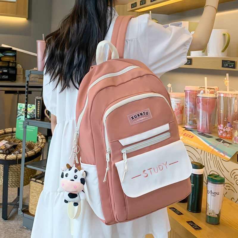 School bag wholesale children's high school junior high school primary school students grades one, two, three to six ultra-light weight reduction backpack women's multi-capacity