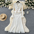 Luxury chic women's dress - autumn  collection: slim-fit knit maxi dress with metallic buckle detail, inspired by chanel