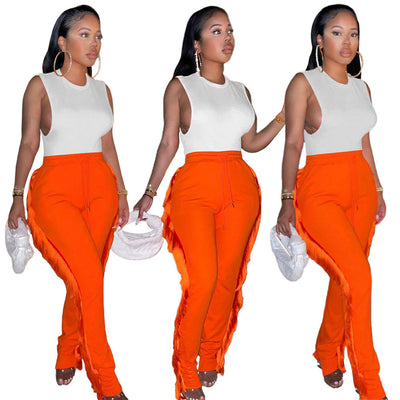 S390255 european and american style women's clothing  supply - solid color sexy drawstring elastic waist side fringe casual pants for women