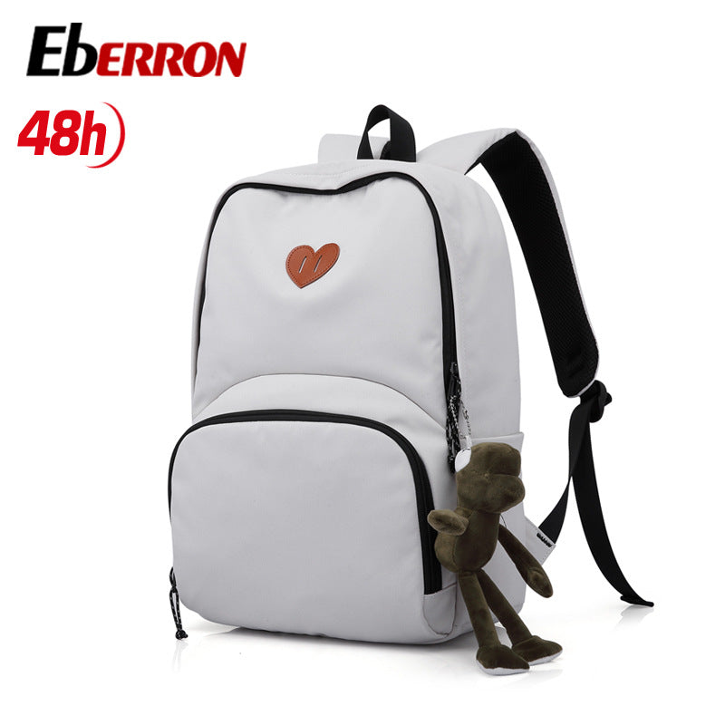 New simple and versatile schoolbag, high-value dirt-resistant belt, doll large-capacity backpack, male and female middle school student backpack.