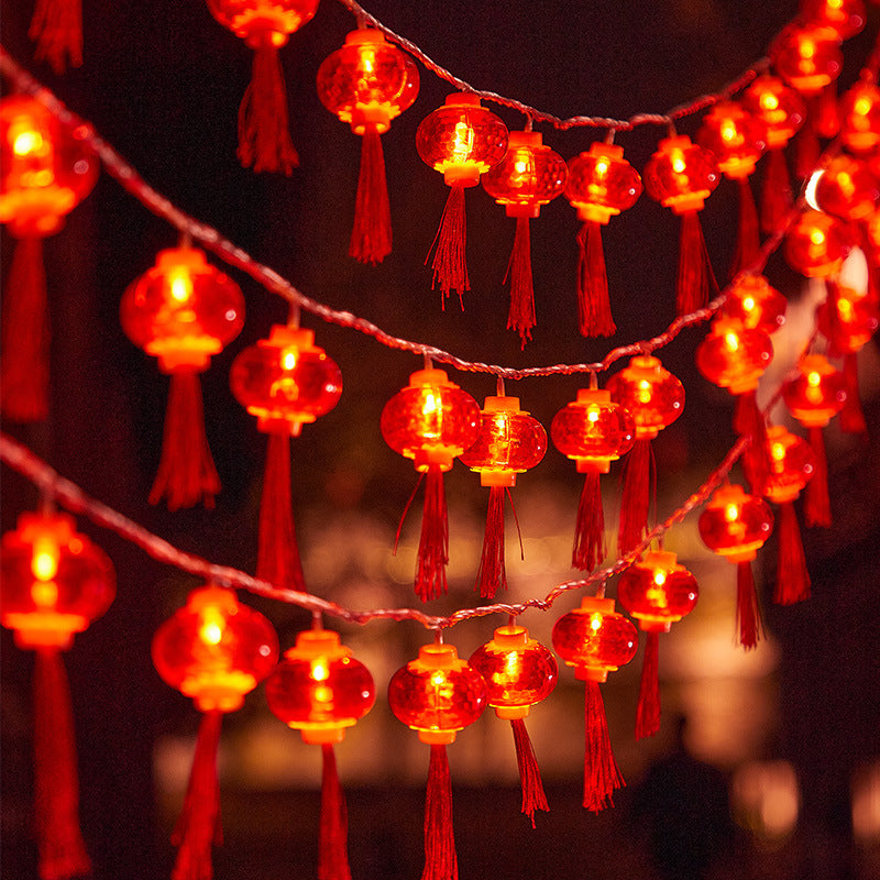 LED lantern string, Chinese New Year lanterns, Spring Festival flashing lights, festive Lantern Festival, New Year's fringed red lanterns