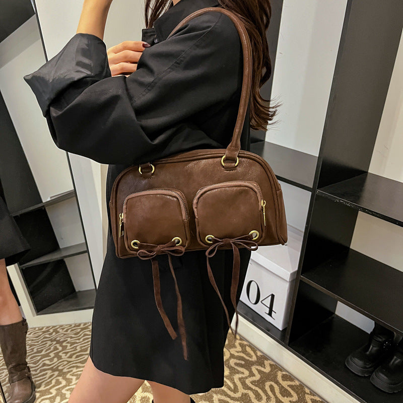 Simple retro underarm bag women's 2025 winter new Korean version niche portable commuter shoulder bag
