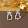 Er-12 silver horseshoe earrings