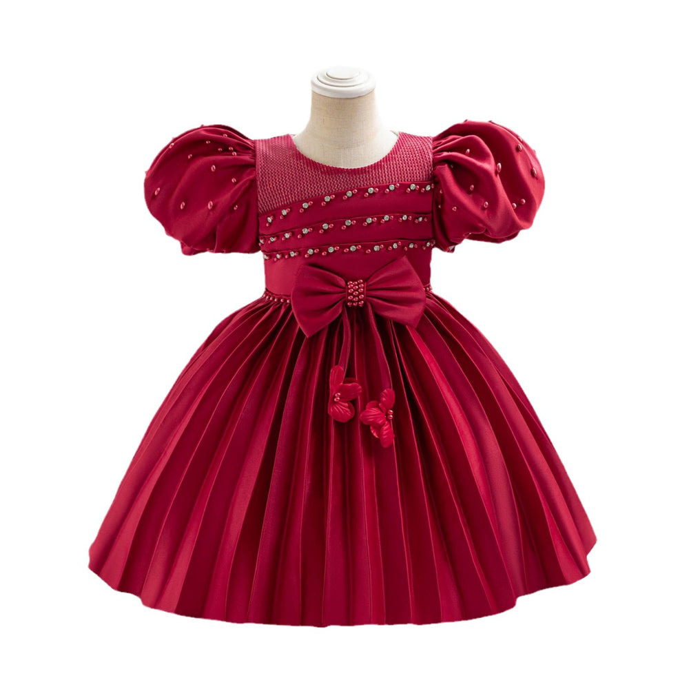Ready-to-ship wholesale toddler evening gowns, fabric bows, princess dresses, piano recital dresses, and baby dresses