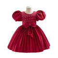 Ready-to-ship wholesale toddler evening gowns, fabric bows, princess dresses, piano recital dresses, and baby dresses