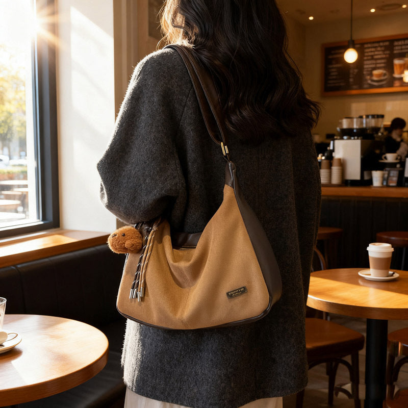 Korean style minimalist suede shoulder bag for women, new autumn 2025 collection, large capacity, fashionable niche design, commuter crossbody bag