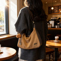 Korean style minimalist suede shoulder bag for women, new autumn 2025 collection, large capacity, fashionable niche design, commuter crossbody bag