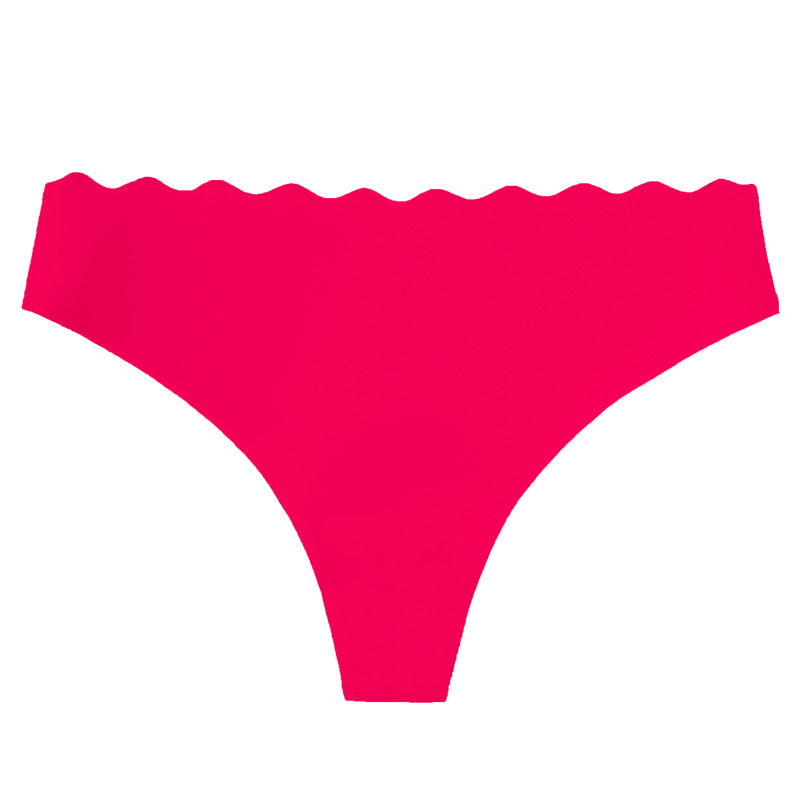 European and american  low-waist seamless ice silk underwear one-piece adhesive pure color cut out wavy waist women's underwear