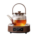 A complete set of wood grain electric ceramic stoves for making tea around the stove, a set of glass teapots for making tea around the stove, and an electric stove