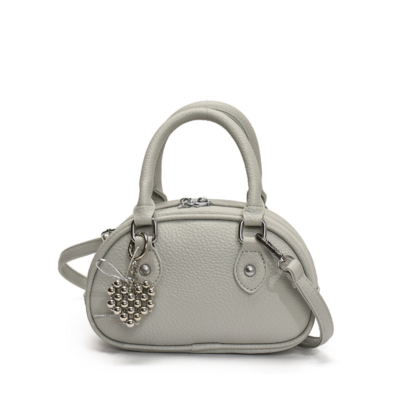 high-end niche 2025 new versatile shoulder cross-body women's bag bowling small square bag fashionable shell bag