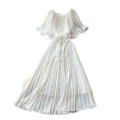 French-inspired pleated dress for women, featuring a bow tie, off-the-shoulder design, tie-waist, and flattering pleats for an elegant and sophisticated look