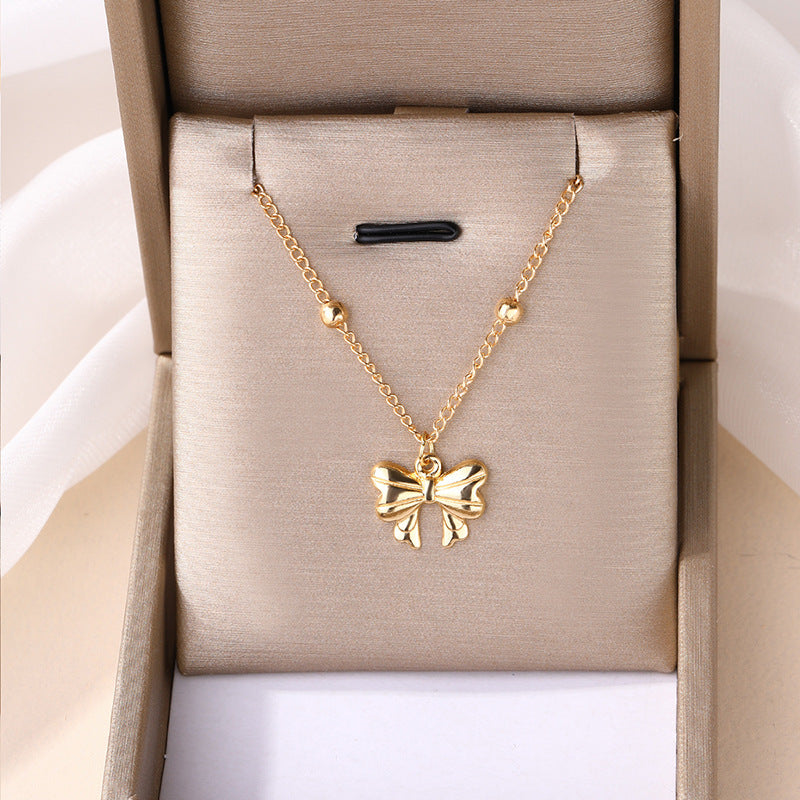 Wholesale bowknot necklaces - new european and american cross-border jewelry, niche light luxury necklaces, simple and versatile alloy pendants for women