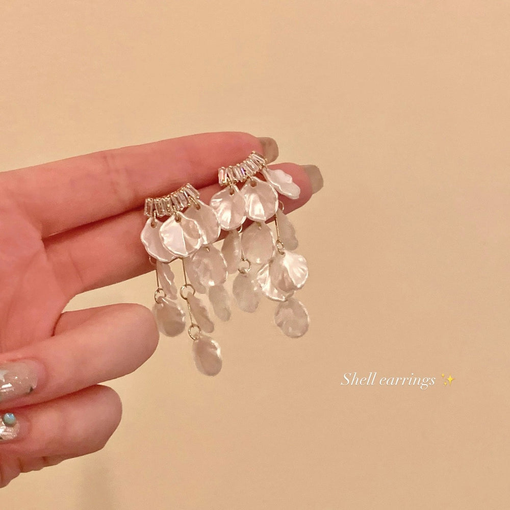 French chic seashell tassel earrings - exquisite, high-end, beachy vacation style studs - stunning statement earrings